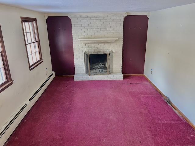 unfurnished living room with carpet floors, a baseboard radiator, a brick fireplace, and baseboards