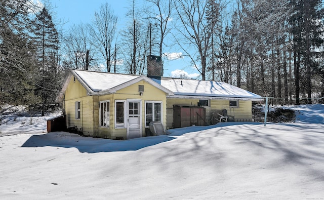 exterior space with a chimney