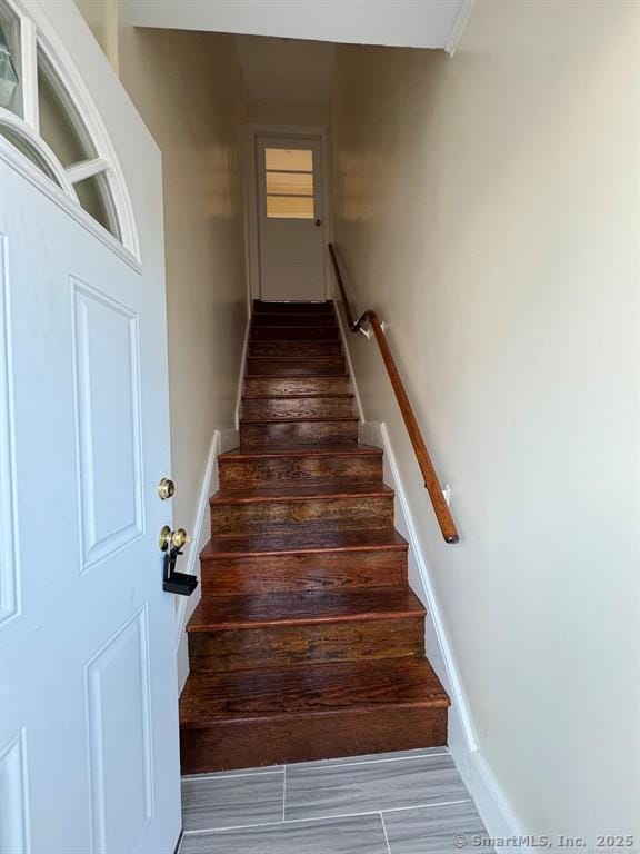 stairway with baseboards