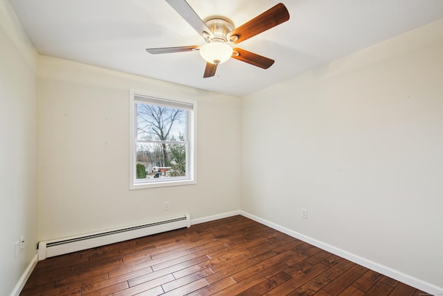 empty room featuring baseboards, a baseboard heating unit, dark wood finished floors, and a ceiling fan