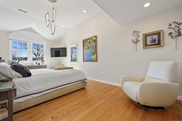 bedroom featuring recessed lighting, visible vents, light wood-style floors, vaulted ceiling, and baseboards