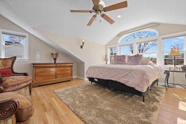 bedroom with baseboards, a ceiling fan, vaulted ceiling, light wood-style floors, and recessed lighting