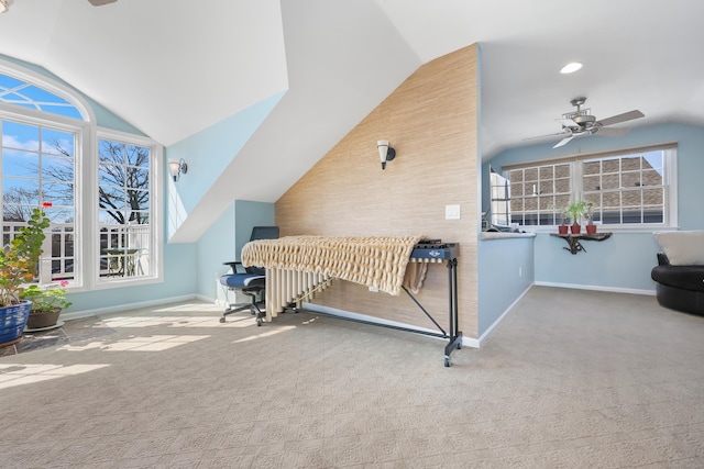 bedroom featuring lofted ceiling, baseboards, and carpet flooring