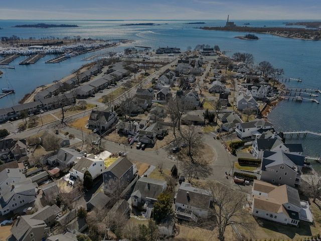 bird's eye view with a water view and a residential view