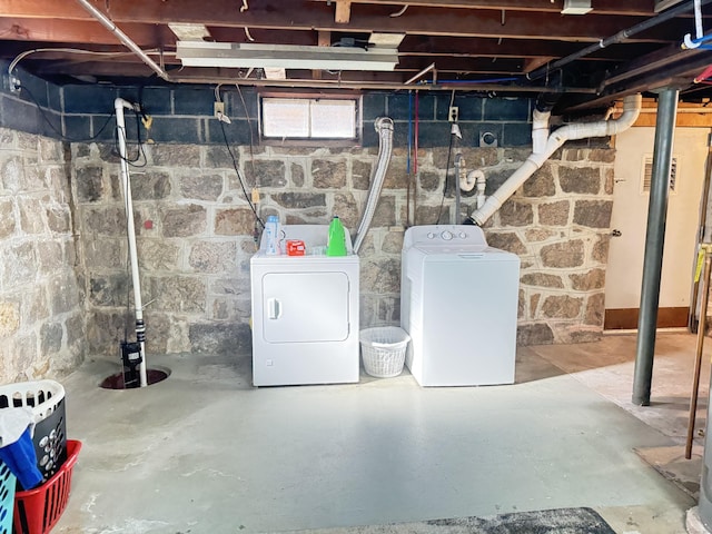 basement featuring washer and dryer