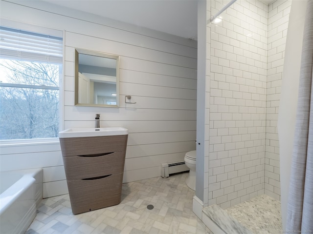 full bathroom featuring toilet, wood walls, vanity, tiled shower, and baseboard heating