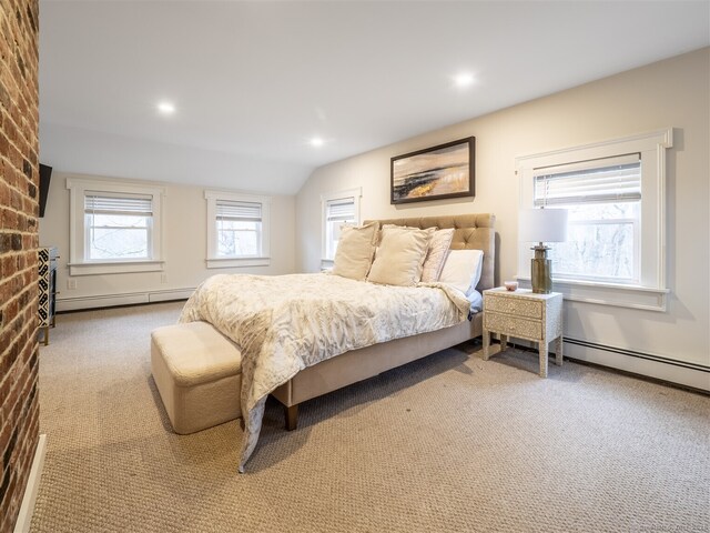 bedroom featuring a baseboard heating unit, carpet floors, lofted ceiling, and recessed lighting