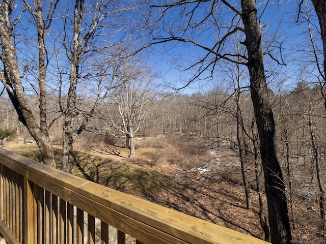 wooden deck featuring fence