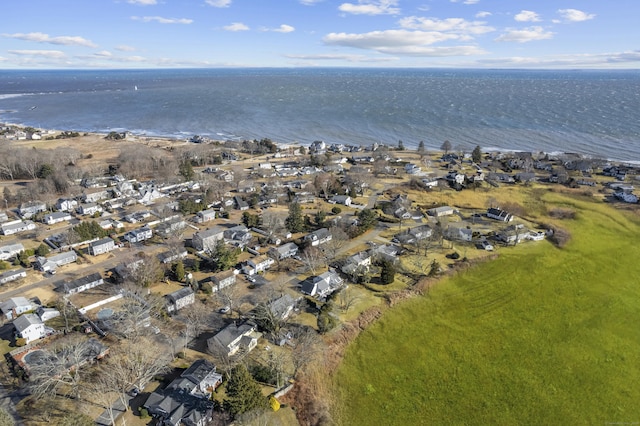 aerial view with a residential view and a water view