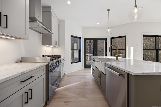 1600 S Main St, Cheshire, CT 06410 - kitchen with an island with sink, appliances with stainless steel finishes, a sink, and decorative light fixtures