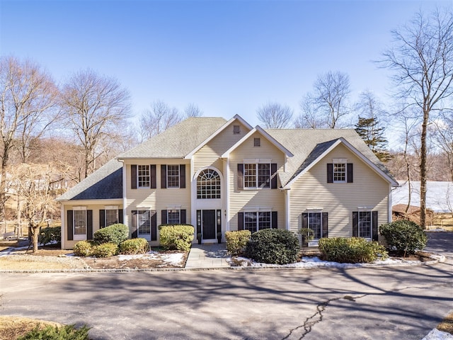 view of front of house featuring roof with shingles