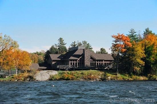 exterior space with a water view