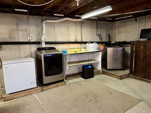 laundry room featuring laundry area and separate washer and dryer