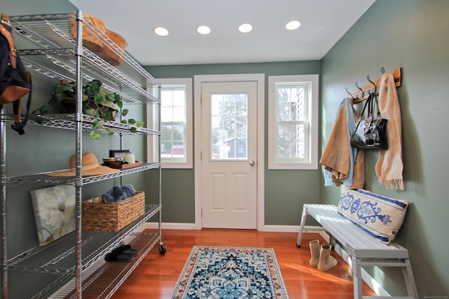 mudroom featuring recessed lighting, baseboards, and wood finished floors