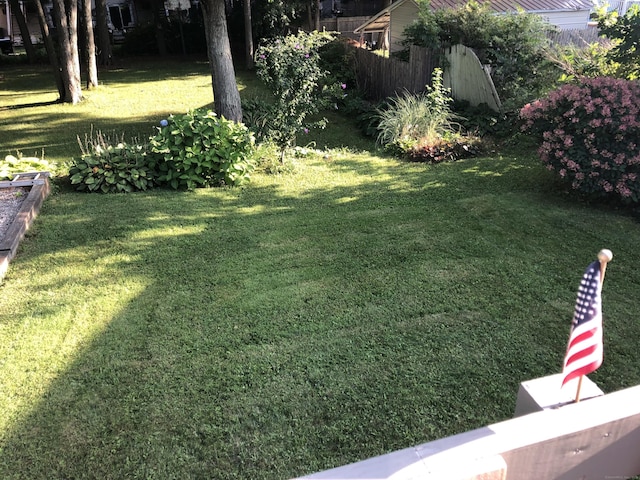 view of yard with fence