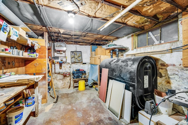 unfinished basement featuring heating fuel