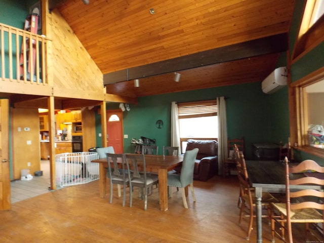 dining area with wooden ceiling, wood finished floors, beam ceiling, and a wall mounted air conditioner