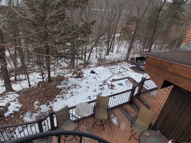 view of snow covered deck