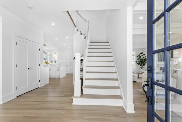 40 Fairfield Beach Rd, Fairfield, CT 06824 - entrance foyer with wood finished floors, stairway, recessed lighting, and baseboards