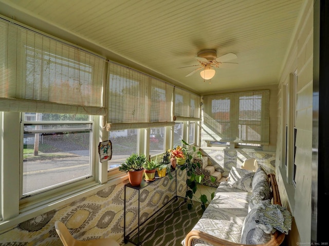 sunroom / solarium with ceiling fan