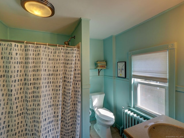 full bath with a shower with shower curtain, toilet, radiator heating unit, vanity, and tile patterned floors