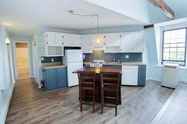 kitchen featuring white appliances, a sink, white cabinets, open shelves, and pendant lighting