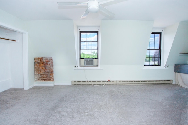 empty room with carpet, a baseboard radiator, cooling unit, and a ceiling fan