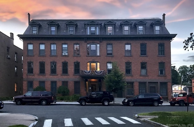 view of property at dusk