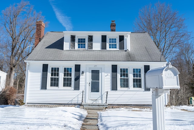 view of front of home with a chimney