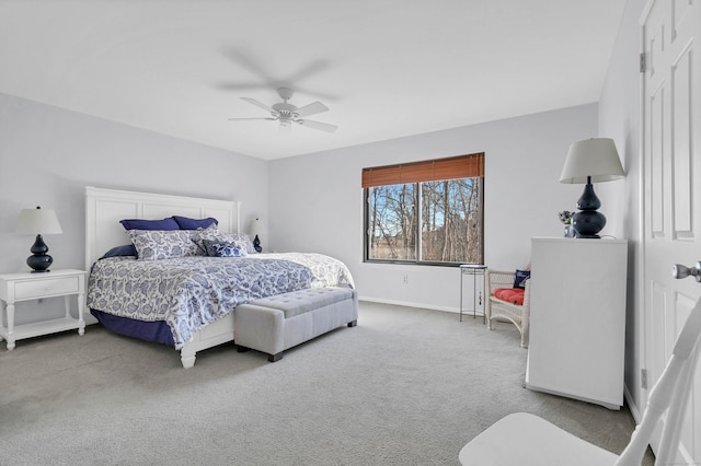 bedroom featuring a ceiling fan, carpet flooring, and baseboards