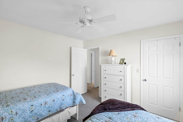 carpeted bedroom featuring a ceiling fan