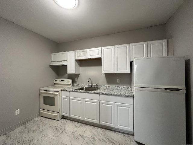 kitchen featuring a sink, white cabinetry, marble finish floor, white range with electric stovetop, and freestanding refrigerator