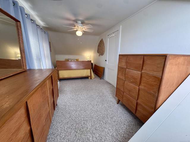 bedroom with carpet floors, ceiling fan, and lofted ceiling