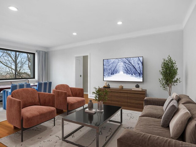 living area featuring recessed lighting and wood finished floors