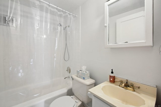 full bathroom with vanity, toilet, and shower / bath combo with shower curtain