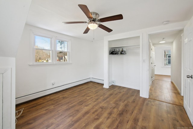 unfurnished bedroom featuring ceiling fan, dark wood-type flooring, a closet, and a baseboard radiator