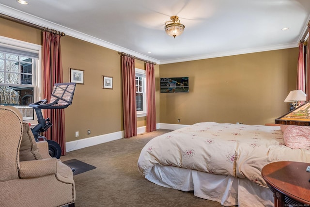 carpeted bedroom with ornamental molding, multiple windows, and baseboards