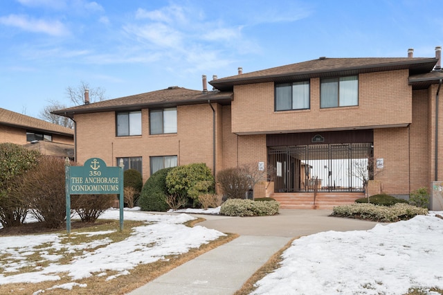 view of front of property with brick siding