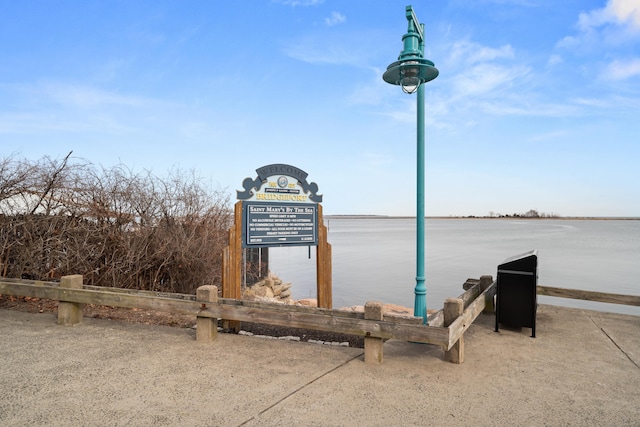 exterior space with a water view