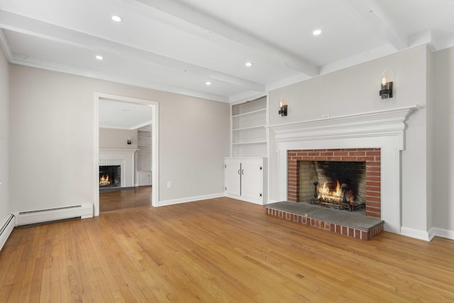 unfurnished living room with baseboards, hardwood / wood-style flooring, a baseboard radiator, a brick fireplace, and beam ceiling