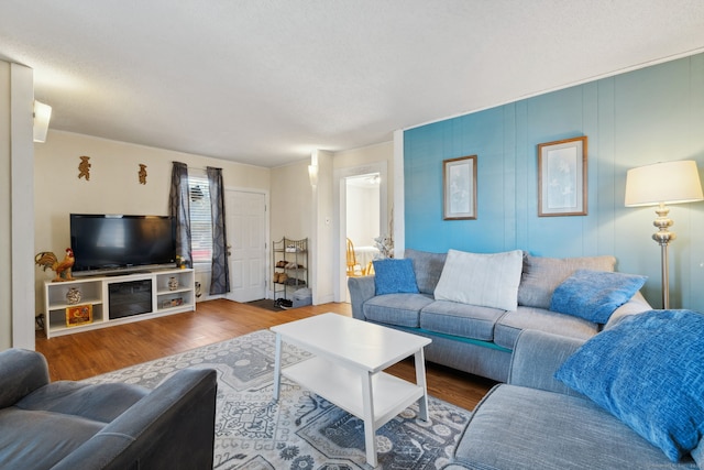 living area with wood finished floors