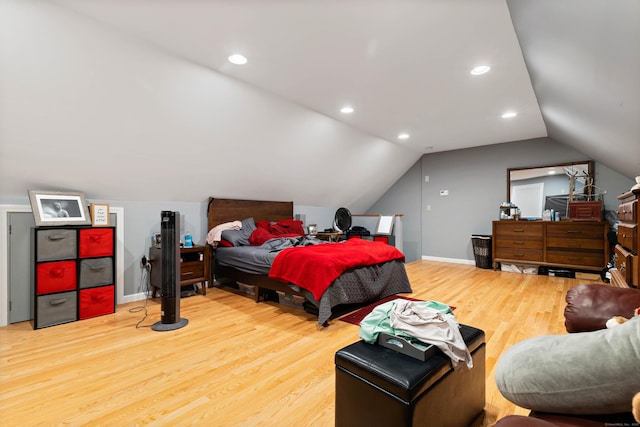 bedroom featuring baseboards, vaulted ceiling, wood finished floors, and recessed lighting