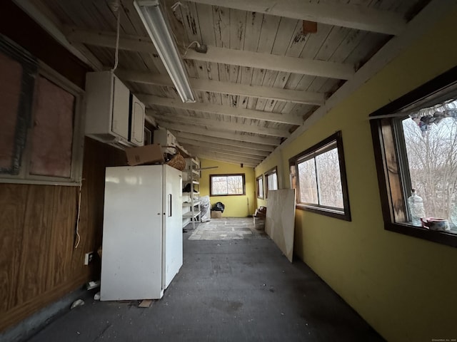 interior space with vaulted ceiling with beams and wood ceiling