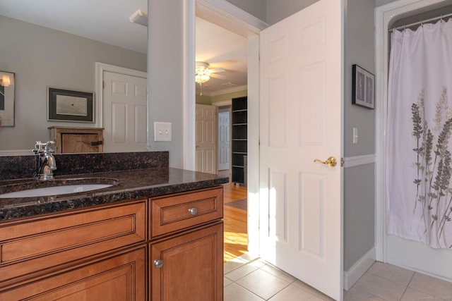 bathroom with a shower with curtain, tile patterned flooring, vanity, and a ceiling fan