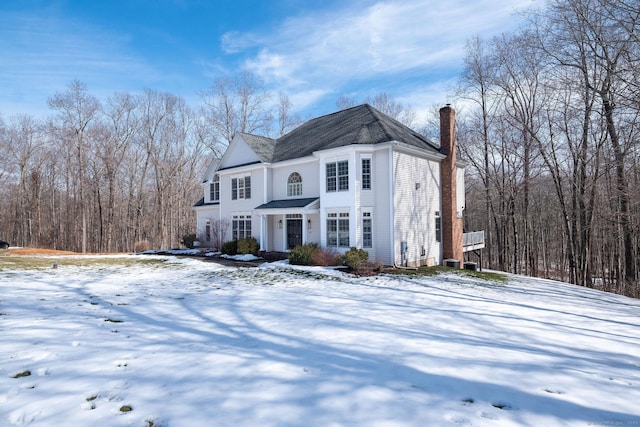 view of front of property with a chimney