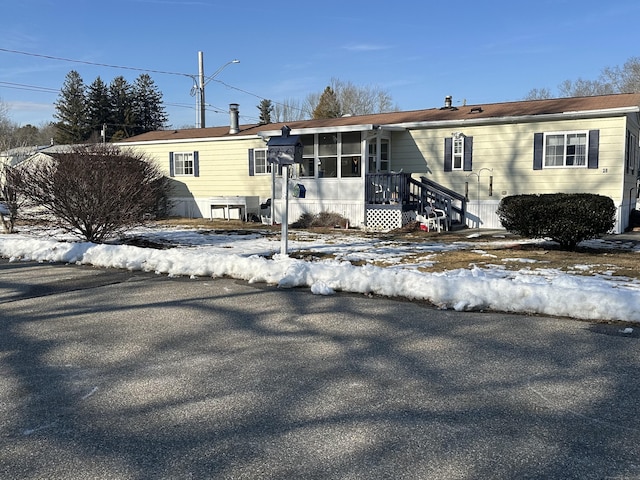 manufactured / mobile home with a sunroom