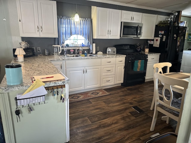 kitchen featuring dark wood-style floors, black appliances, and white cabinetry