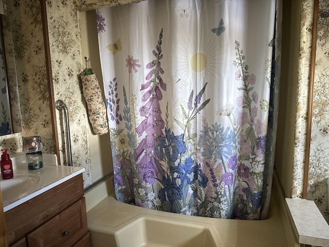 interior details with wallpapered walls and vanity