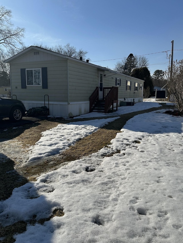 view of snow covered property