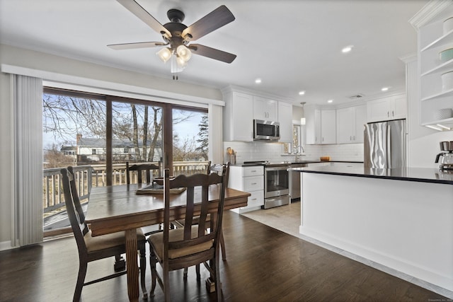 dining area with ceiling fan, light wood-style flooring, and recessed lighting